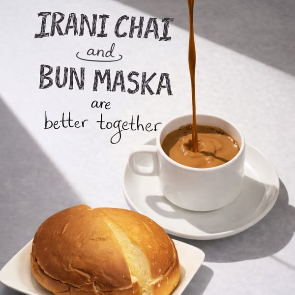 Irani Chai pouring into a white cup next to a bun maska on a white plate.